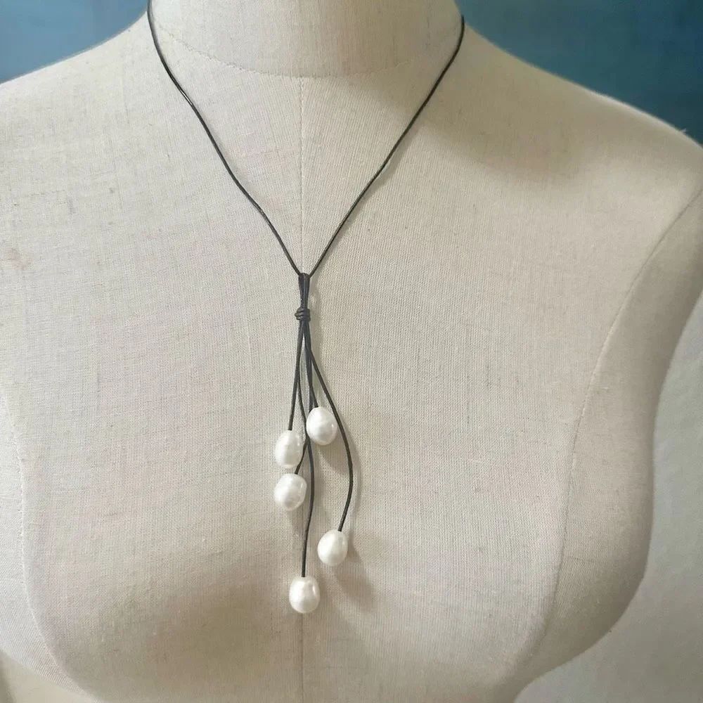 Pearl pendant necklace on cord